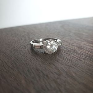 Angled diamond ring